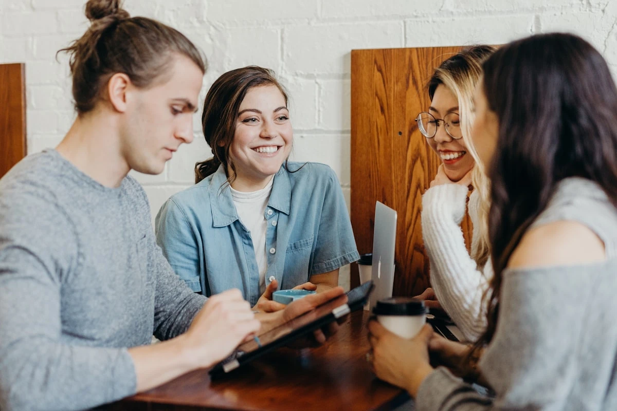 A diverse group of students collaborating on campus